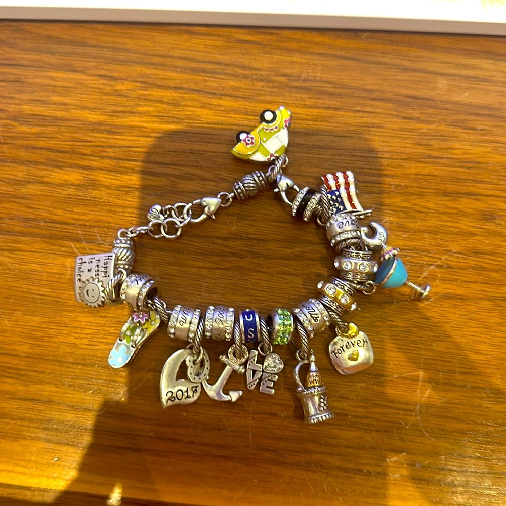 Brighton bracelet with 21 charms total.